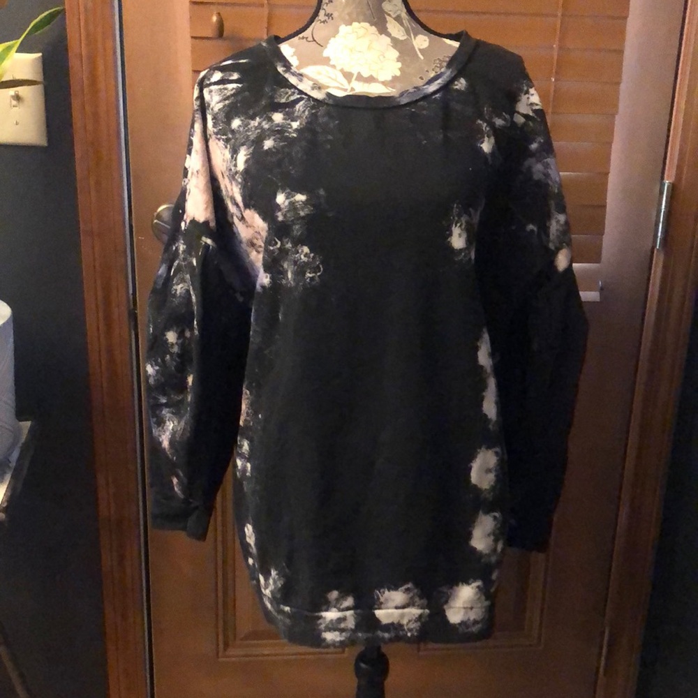 Free People black sweatshirt with billowy pleated sleeves and pink bleach effect